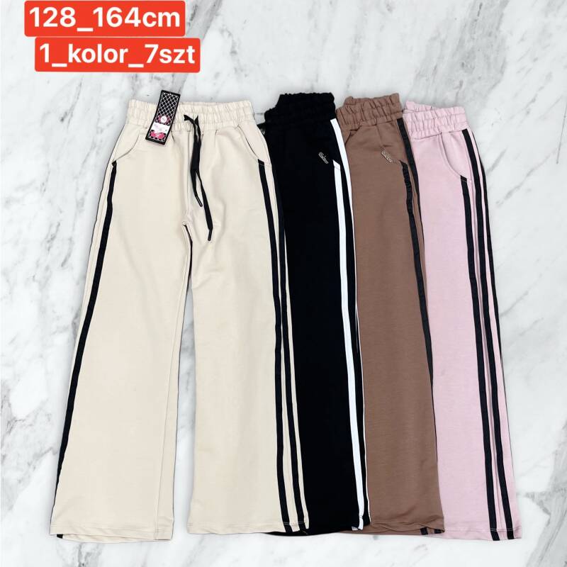 Spodnie dziewczęcy. Roz 128-164. 1 kolor Paczka 7 szt . 1