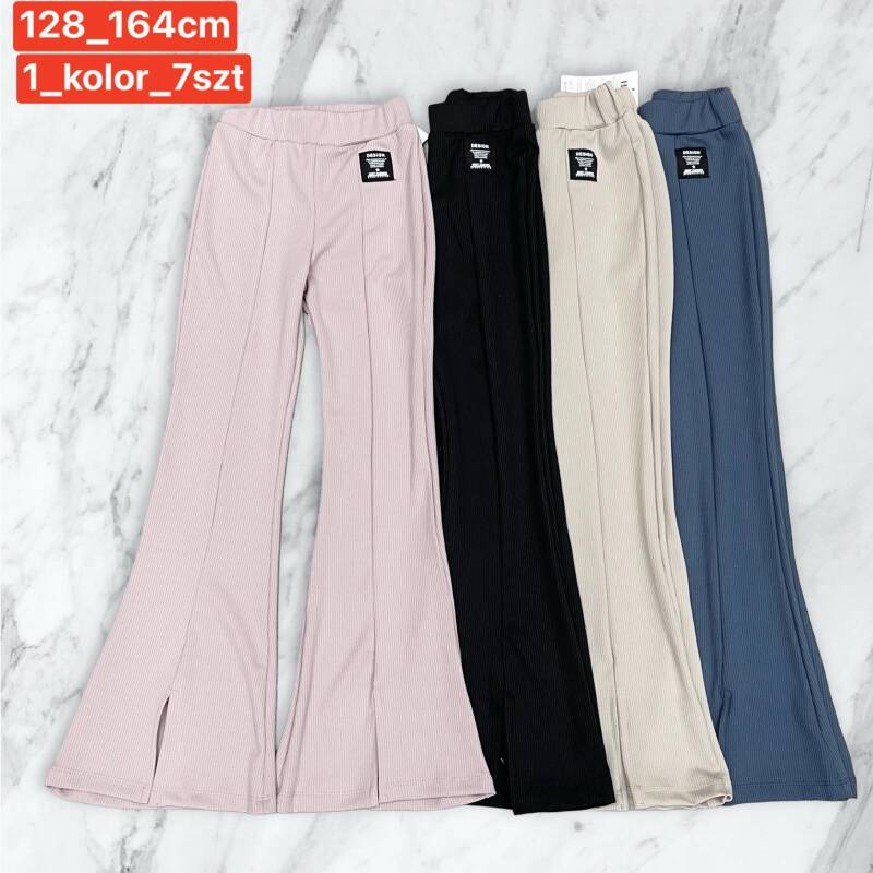 Spodnie dziewczęcy. Roz 128-164. 1 kolor Paczka 7 szt .