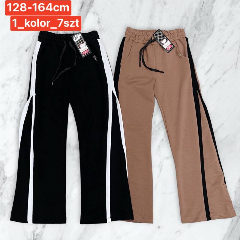 Spodnie dziewczęcy. Roz 128-164. 1 kolor Paczka 7 szt .