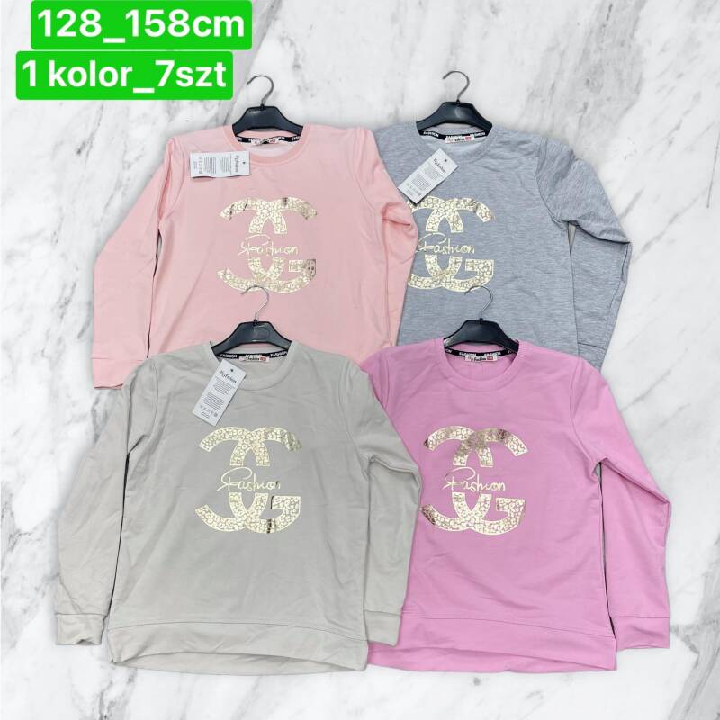 Bluzka dziewczęcy. Roz 128-158. 1 Kolor Paczka 7 szt