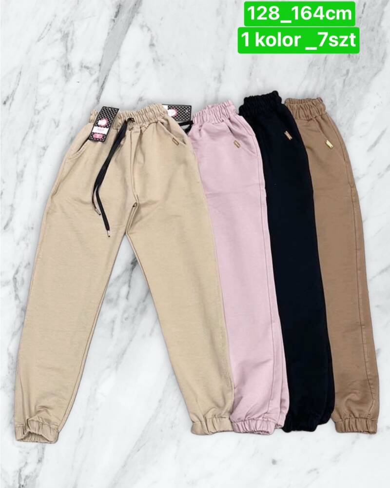Spodnie dziewczęcy. Roz 128-164. 1 kolor Paczka 7 szt .