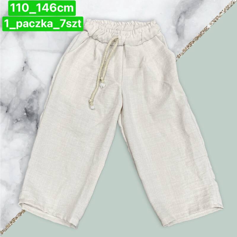 Spodnie dziewczęcy. Roz 110-146. 1 kolor Paczka 7 szt .