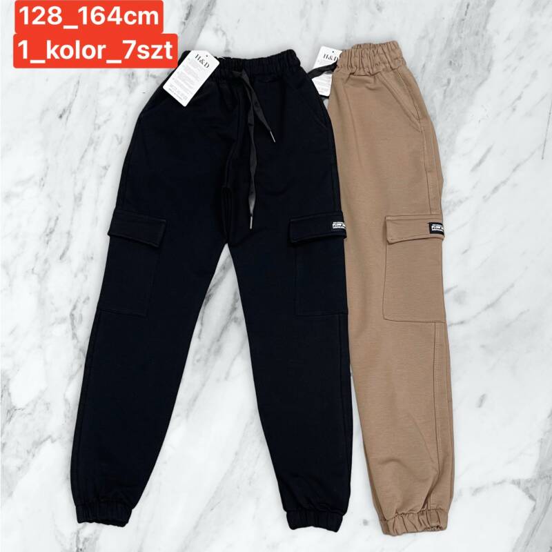 Spodnie chłopięca Roz 128-164. 1 kolor Paczka 7 szt.